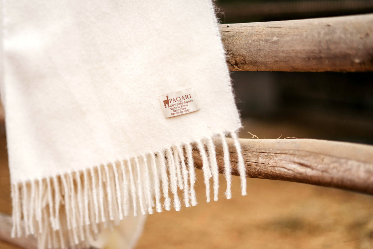 PAQARI woven label on the Natural cream throw, hand-knotted fringe